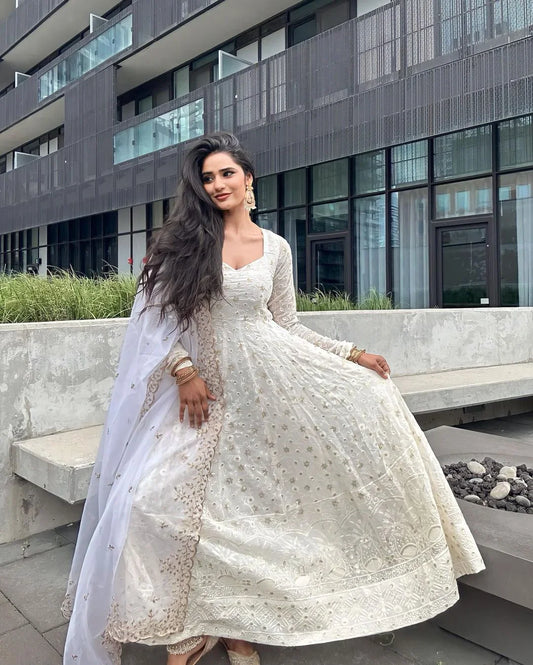 THREAD AND SEQUENCE WORK WHITE COLOR ANARKALI GOWN ₹5,999.00 ₹2,999.00