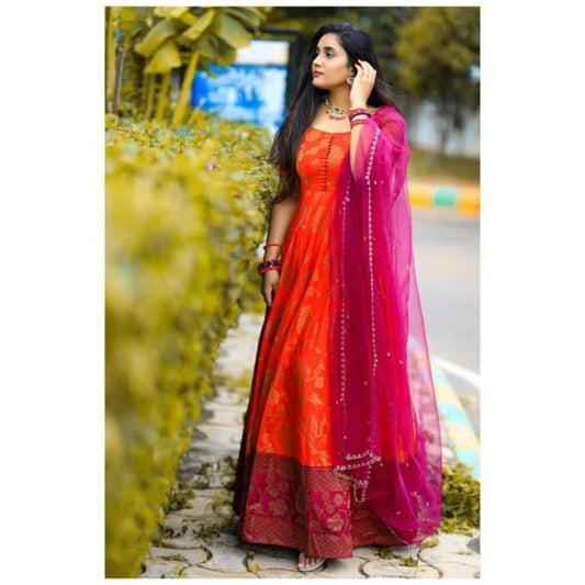 ORANGE SILK GOWN WITH JACQUARD BORDER AND NET DUPATTA