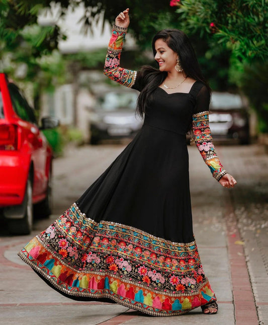 ARRESTING BLACK COLORED BEAUTIFULL EMBROIDERY FLOOR TOUCH GOWN